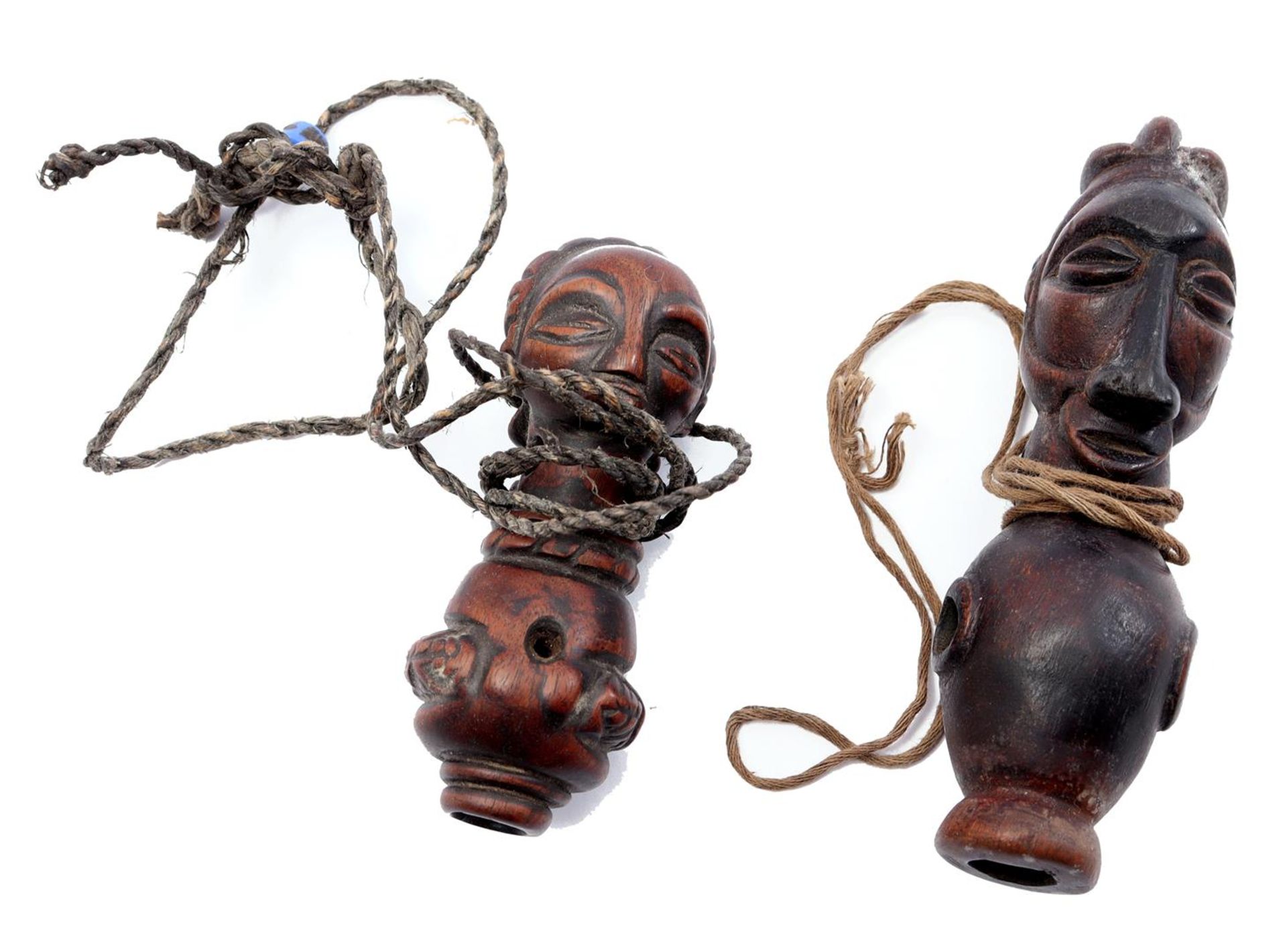 2 wooden flutes with rope, Africa ca. 1970