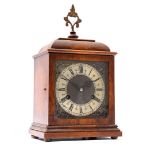 Table clock in walnut cabinet