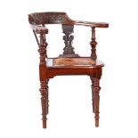 Richly carved walnut corner chair