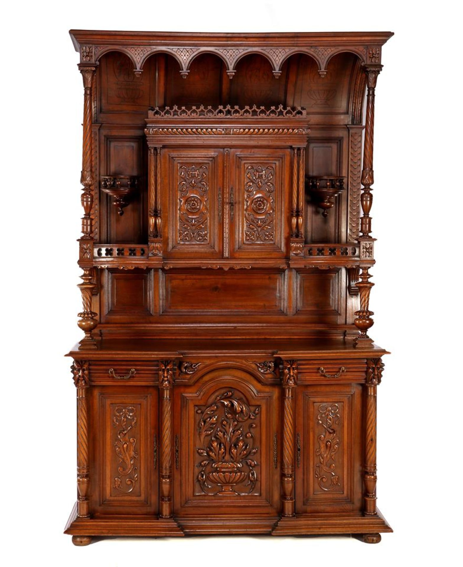Walnut cabinet with richly carved décor