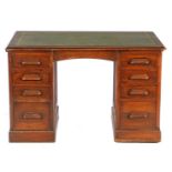 Oak desk with 2 drawer units and green leather