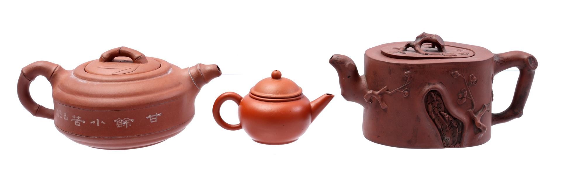 3 Yixing teapots, with bamboo décor