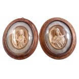 2 oval wall decorations