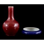 Sang de Boeuf pipe vase and porcelain dish
