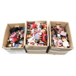 3 boxes with costume dolls