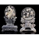 2 richly decorated stone ornamental objects
