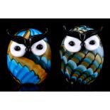 2 colored glass owls