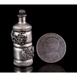 Silver coin and silver plated snuf bottle