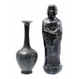 Bronze pipe vase and bronze statue