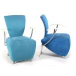 2 blue upholstered armchairs