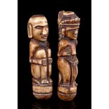2 carved bone figures