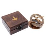 Wooden box with brass compass