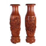 2 solid teak vases