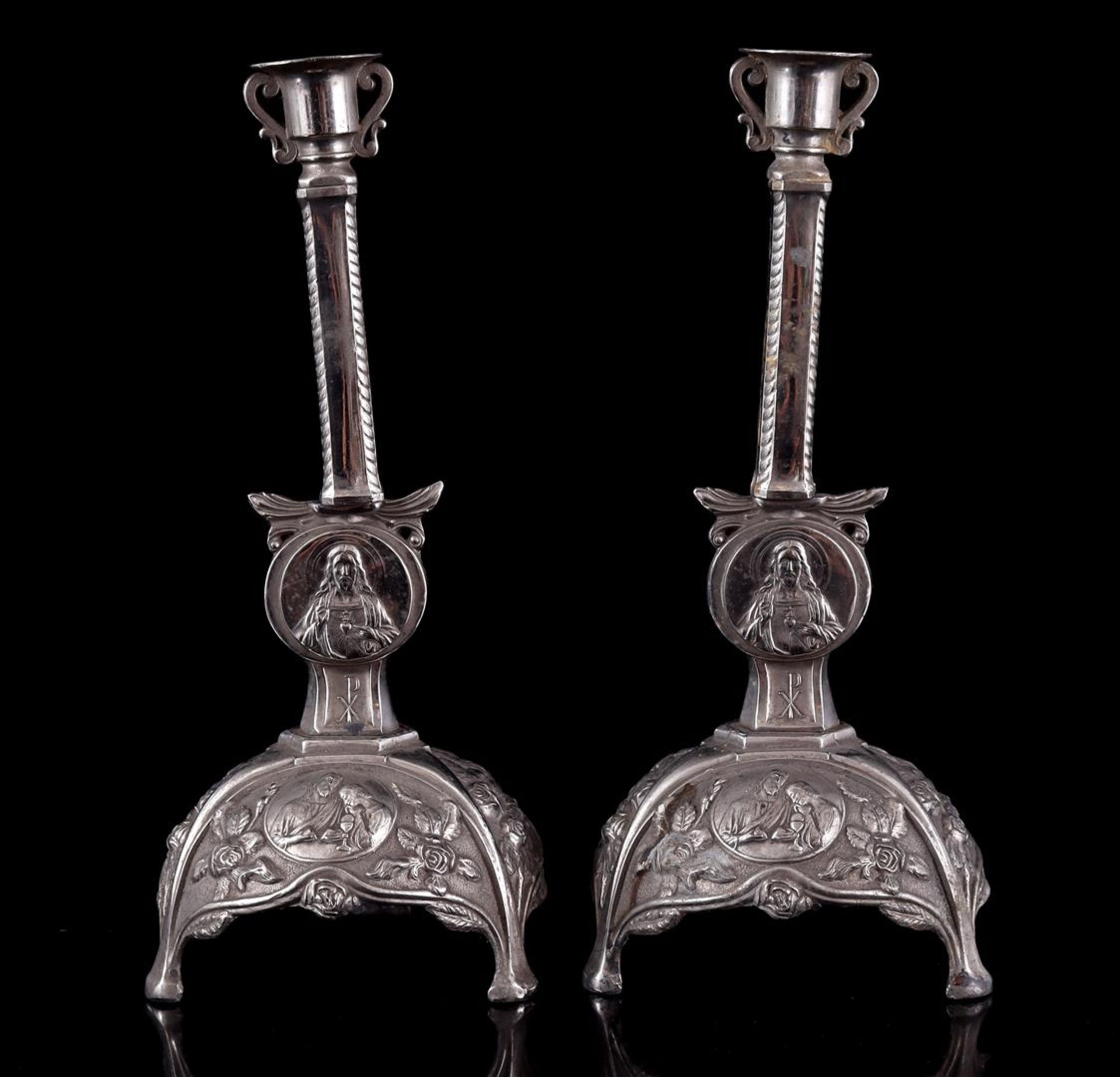 2 metal candlesticks