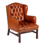 Brown leather armchair