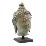 Metal head of a Buddha