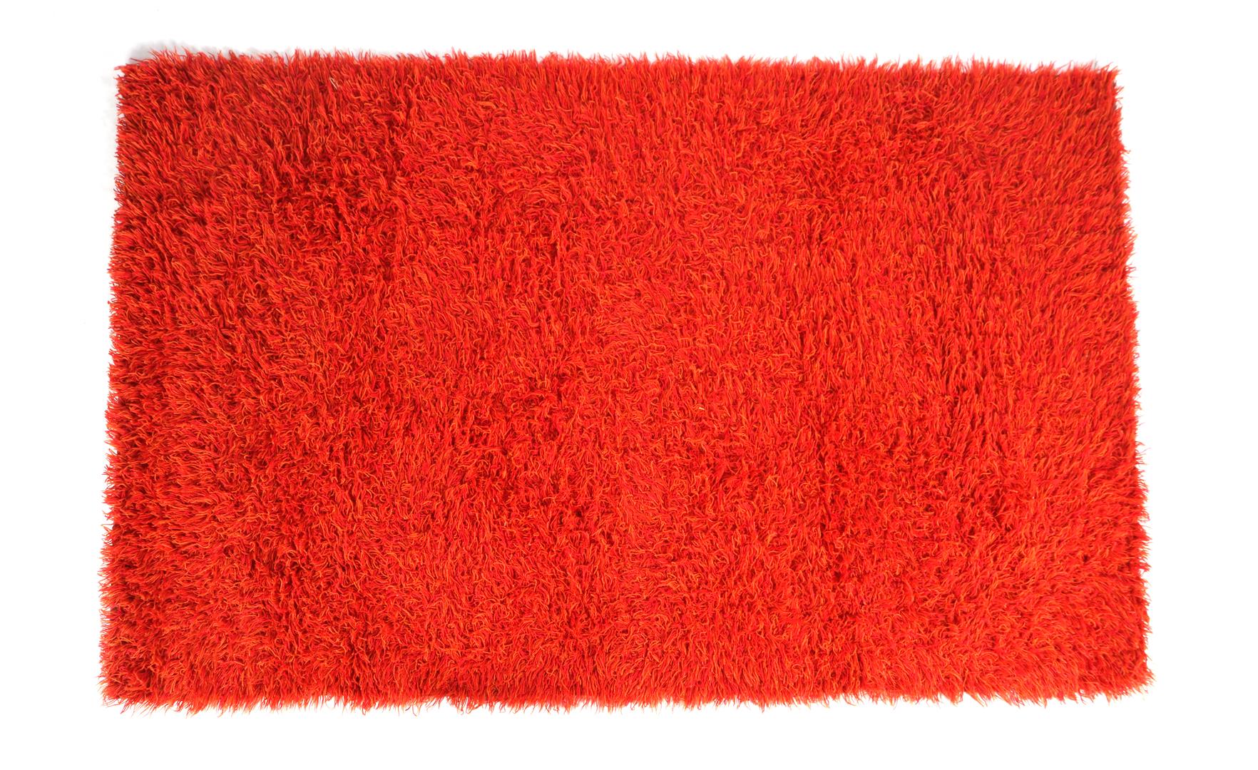 Deep pile orange carpet