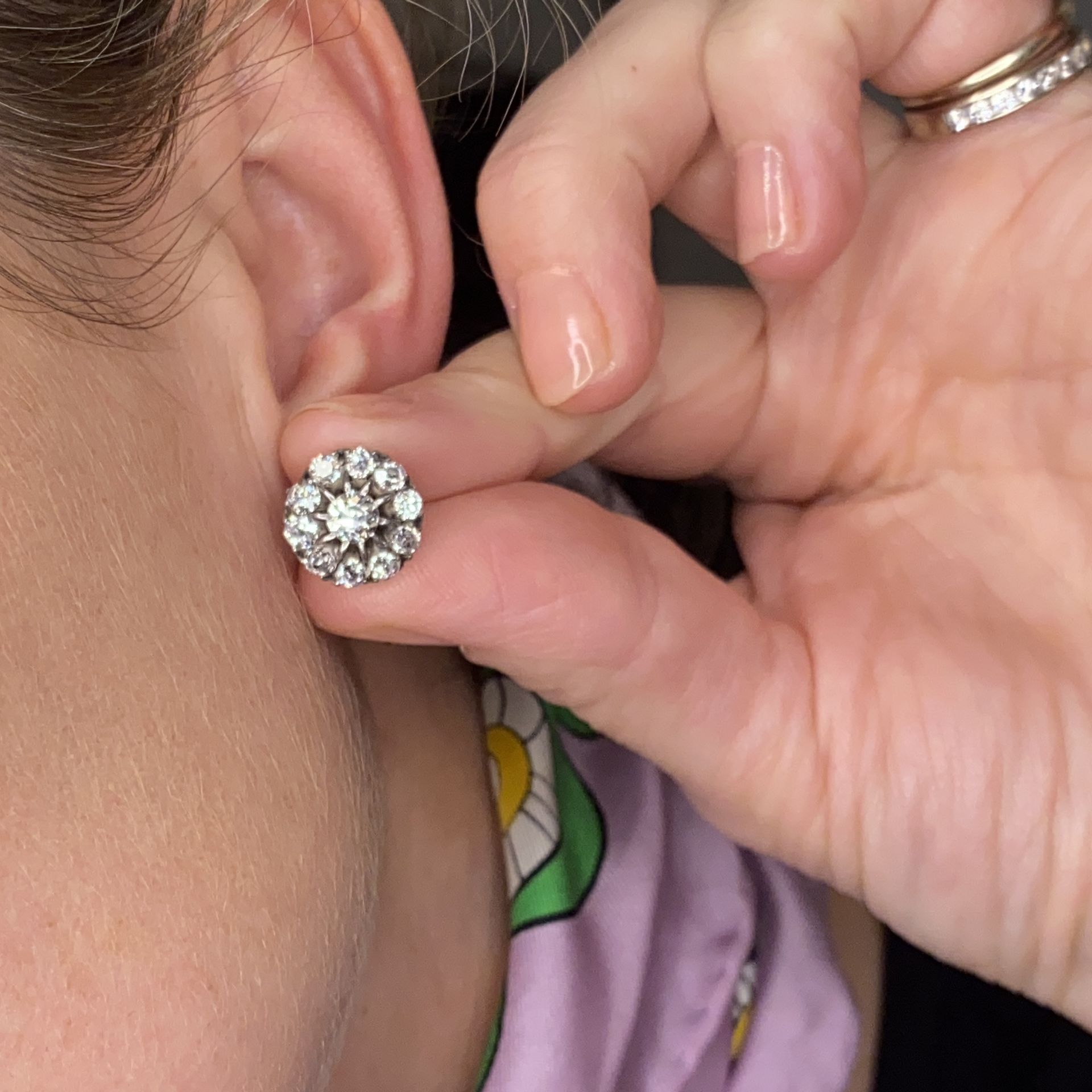 A pair of diamond cluster ear studs, set throughout with old round brilliant-cut diamonds, total - Image 3 of 3