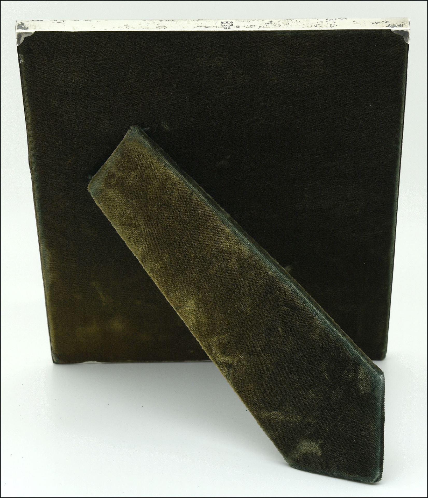 A photograph frame, of plain polished rectangular form, stamped ‘STERLING / 8S’, length 25.5cm. £ - Image 2 of 2