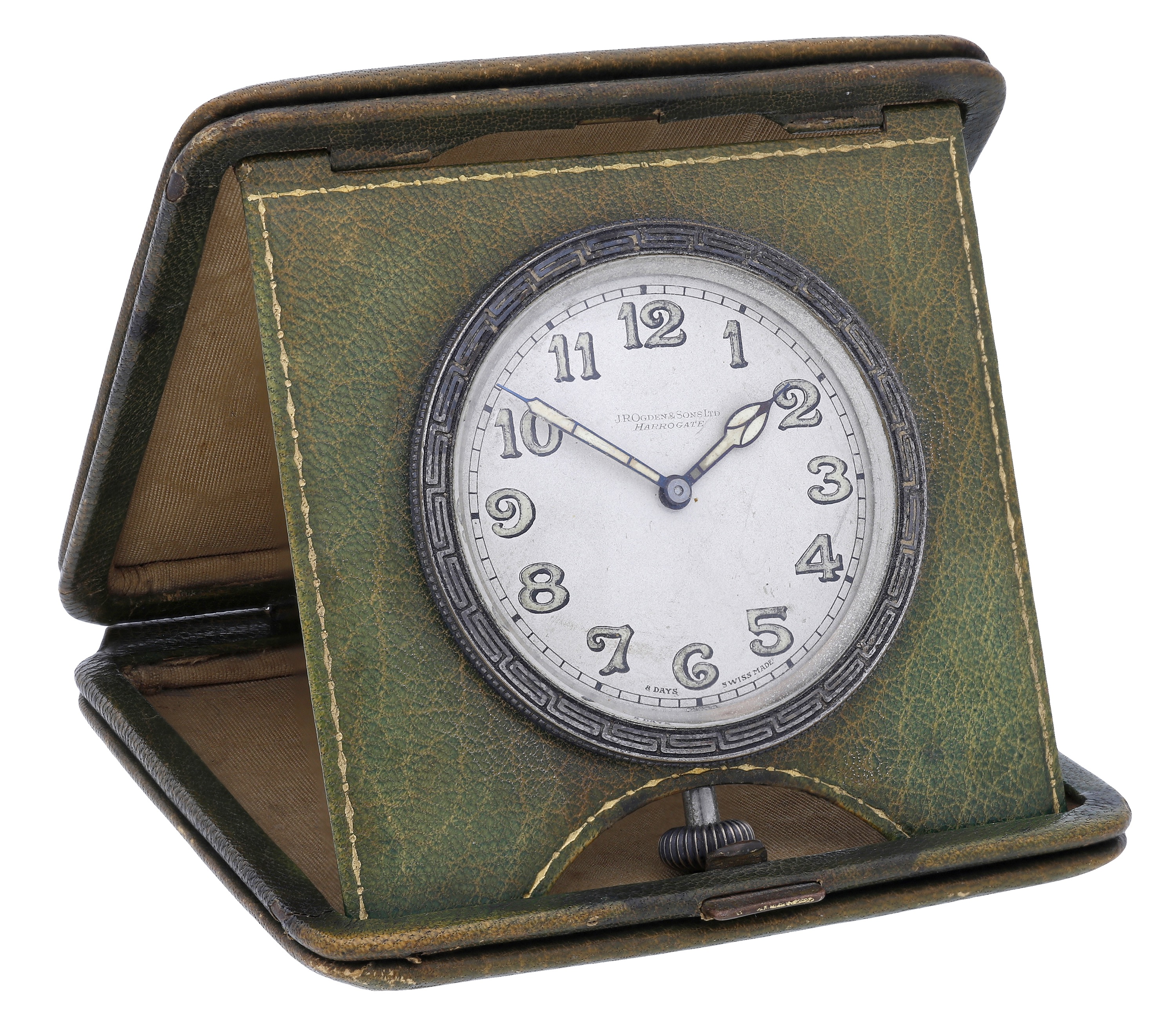 Swiss. Retailed by J R Ogden & Sons Ltd, Harrogate. A leather cased travel timepiece with 8 days...