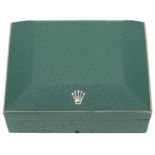 Rolex. A green leather and wooden presentation case, No. 67.00.3, circa 1970 Dimensions: length...