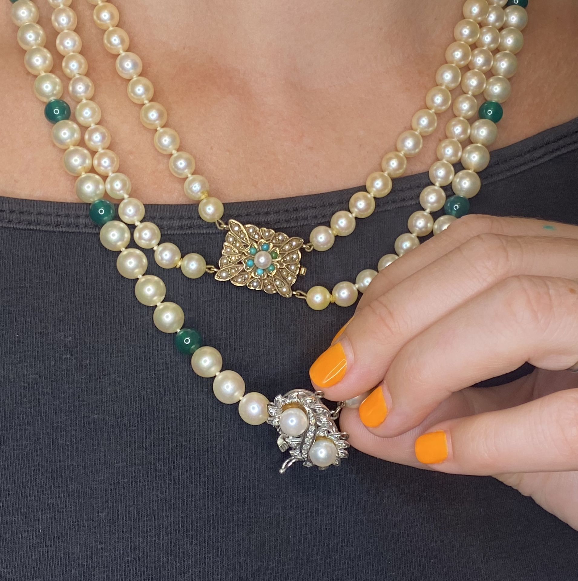 A cultured pearl necklace, the two rows of graduated cultured pearls to a 9ct gold clasp with a c... - Image 2 of 2