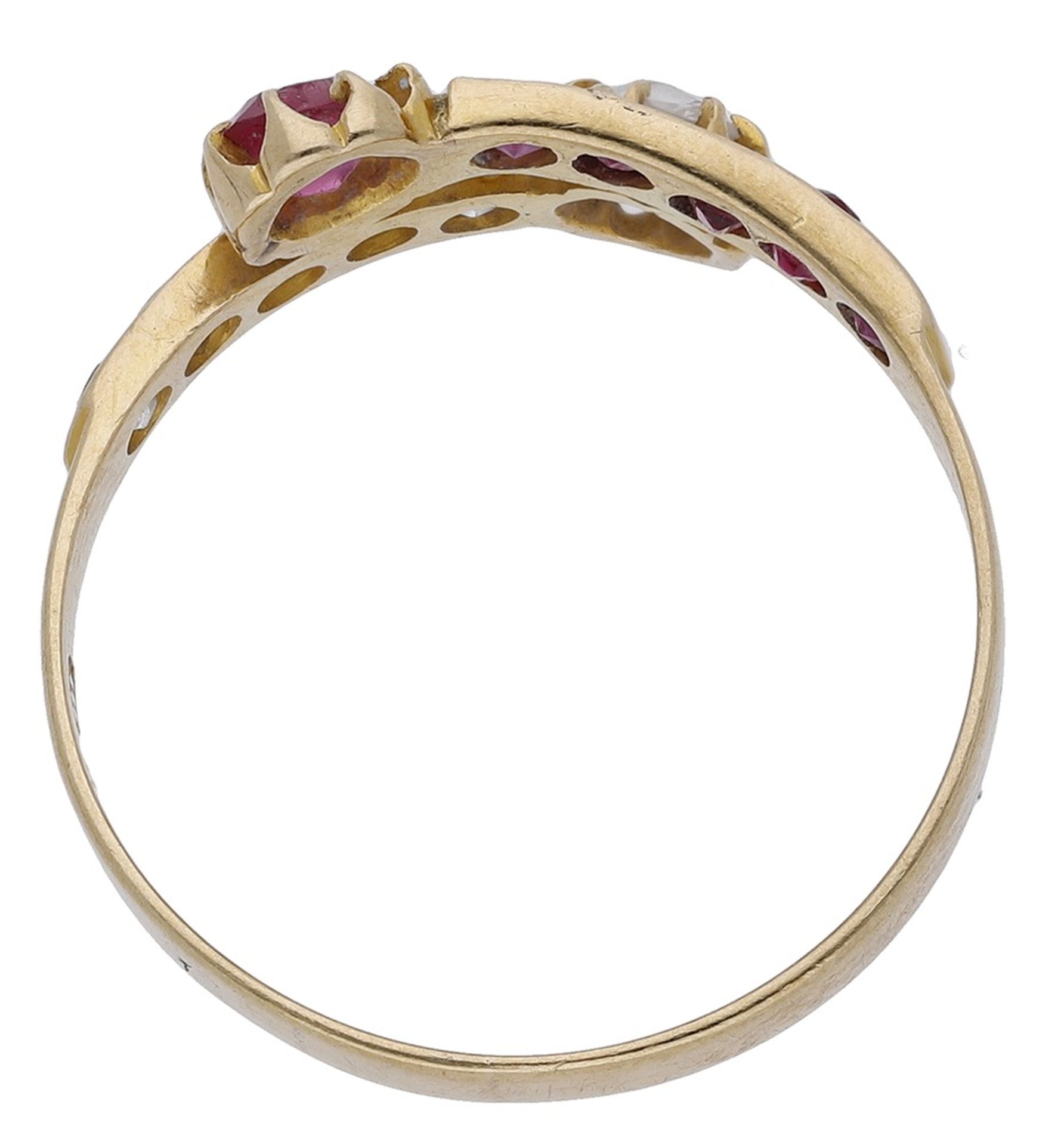 A ruby and diamond crossover ring, 1911, the terminals set with a cushion-shaped ruby and old br... - Image 2 of 3
