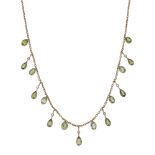 An early 20th century peridot and seed pearl fringe necklace, the belcher-link chain suspending k...