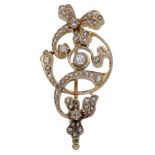A diamond brooch, of Art Nouveau style with foliate details, set throughout with graduated rose-c...