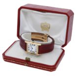Cartier. A gold rectangular wristwatch, Tank, circa 1960. Movement: cal. K921, manual winding, 1...