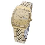 Omega. A gold plated tonneau-form automatic wristwatch with day, date and bracelet, Seamaster, ci...