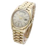 Rolex. A gold automatic wristwatch with day, date and bracelet, Day-Date, Ref. 1803, circa 1976....