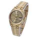 Rolex. A ladyâ€™s gold and diamond-set automatic wristwatch with bracelet, Ref. 69178, Datejust, ci.