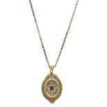 A 19th century gold locket, the central star set with a step-cut emerald within a seed pearl surr...