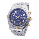 Breitling. A stainless steel and gold automatic chronograph wristwatch with date and bracelet, Re...