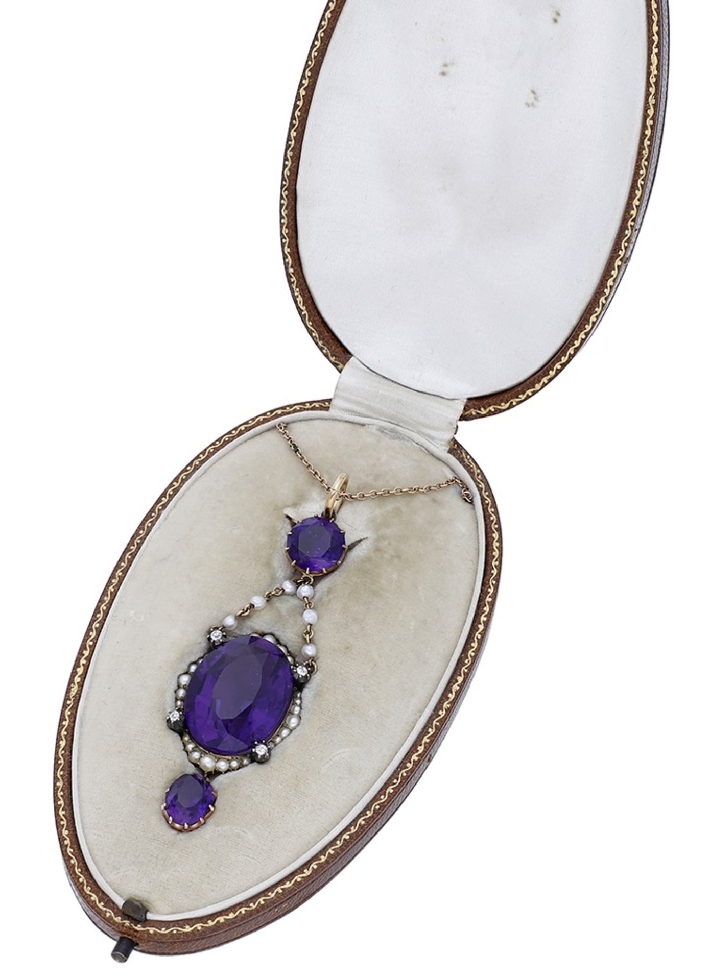 An early 20th century amethyst, seed pearl and diamond pendant on chain, the pendant comprising a...