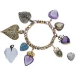 A gold bracelet suspending assorted heart-shaped charms, the hollow curb-link bracelet with caboc...