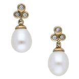 A pair of 18ct gold pearl and diamond earrings, the trefoil surmounts bezel set with brilliant-cu...