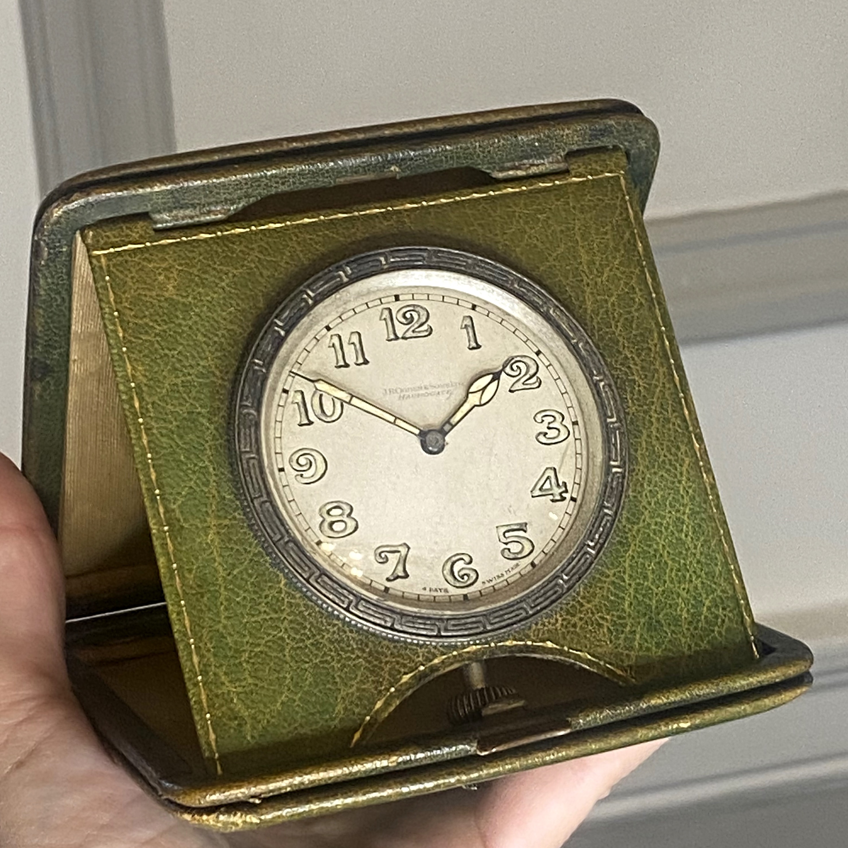 Swiss. Retailed by J R Ogden & Sons Ltd, Harrogate. A leather cased travel timepiece with 8 days... - Image 5 of 5