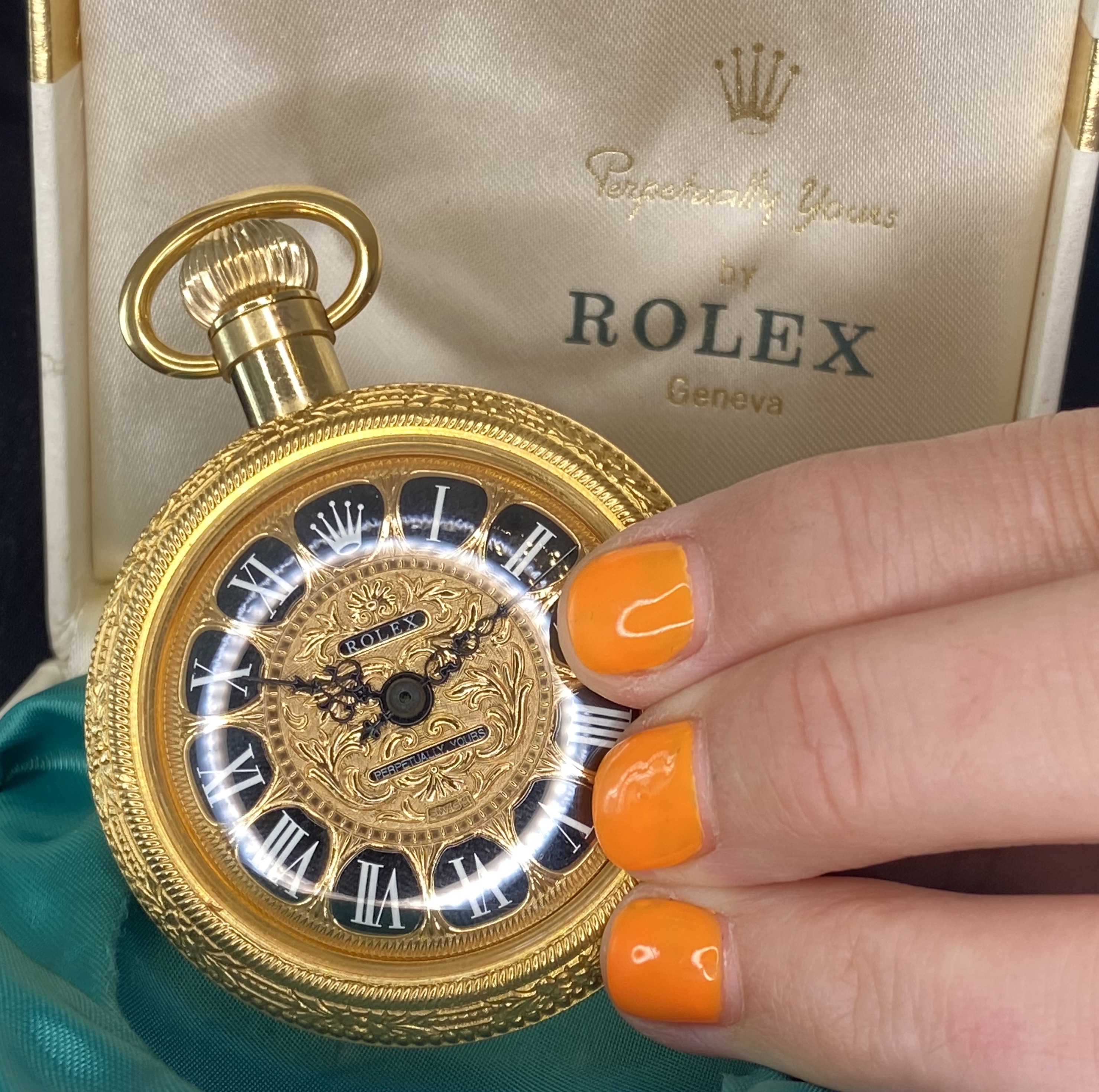 Rolex. A gilt metal and glass perfume bottle in the form of a pocket watch, Perpetually Yours, ci... - Image 6 of 6