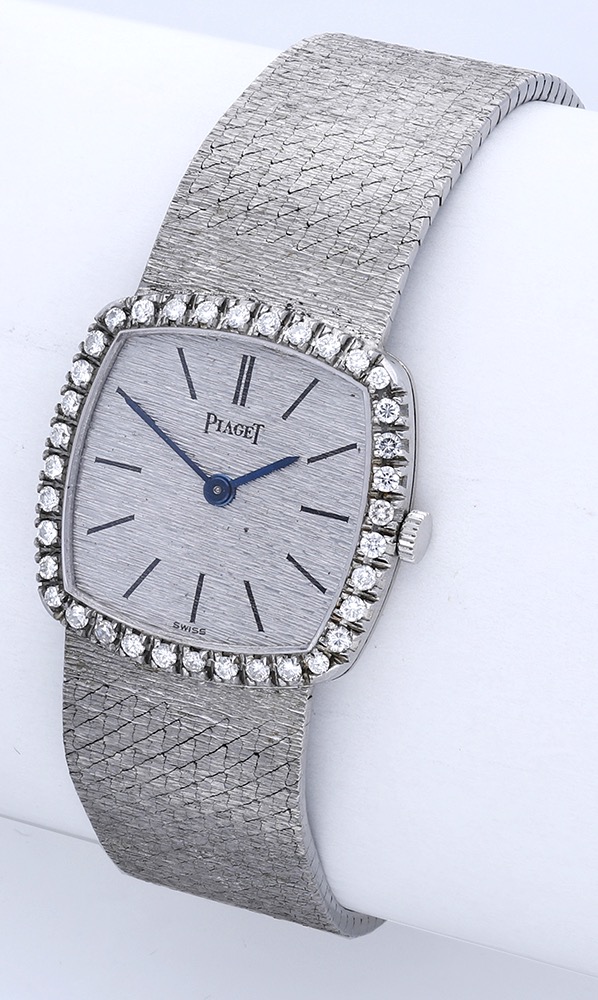 Piaget. A ladyâ€™s white gold and diamond-set bracelet watch, Ref. 9236, circa 1960. Movement: cal..