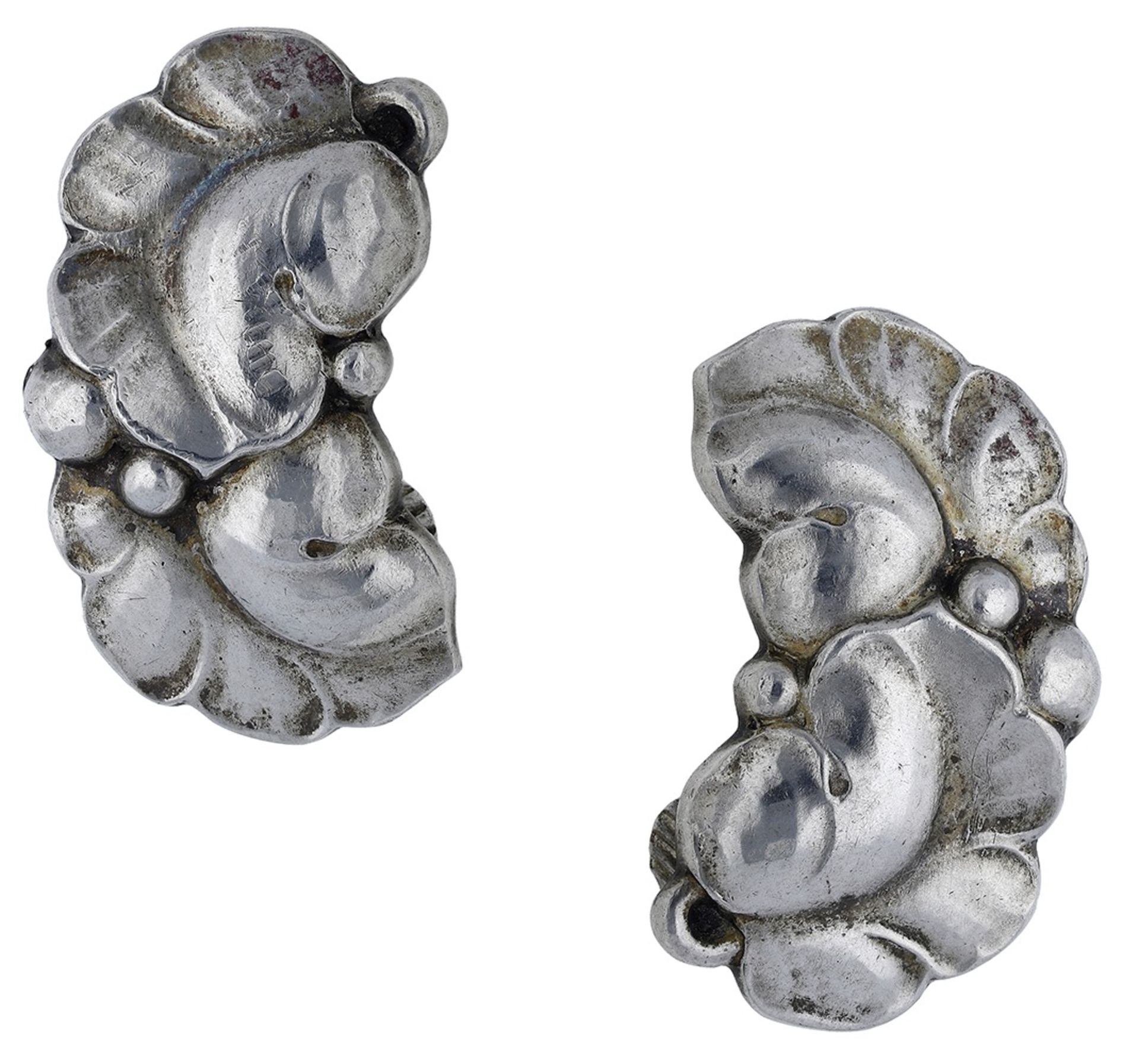 Georg Jensen: A pair of Danish silver ear clips, modelled as leaf and berry designs, post 1945 ma...