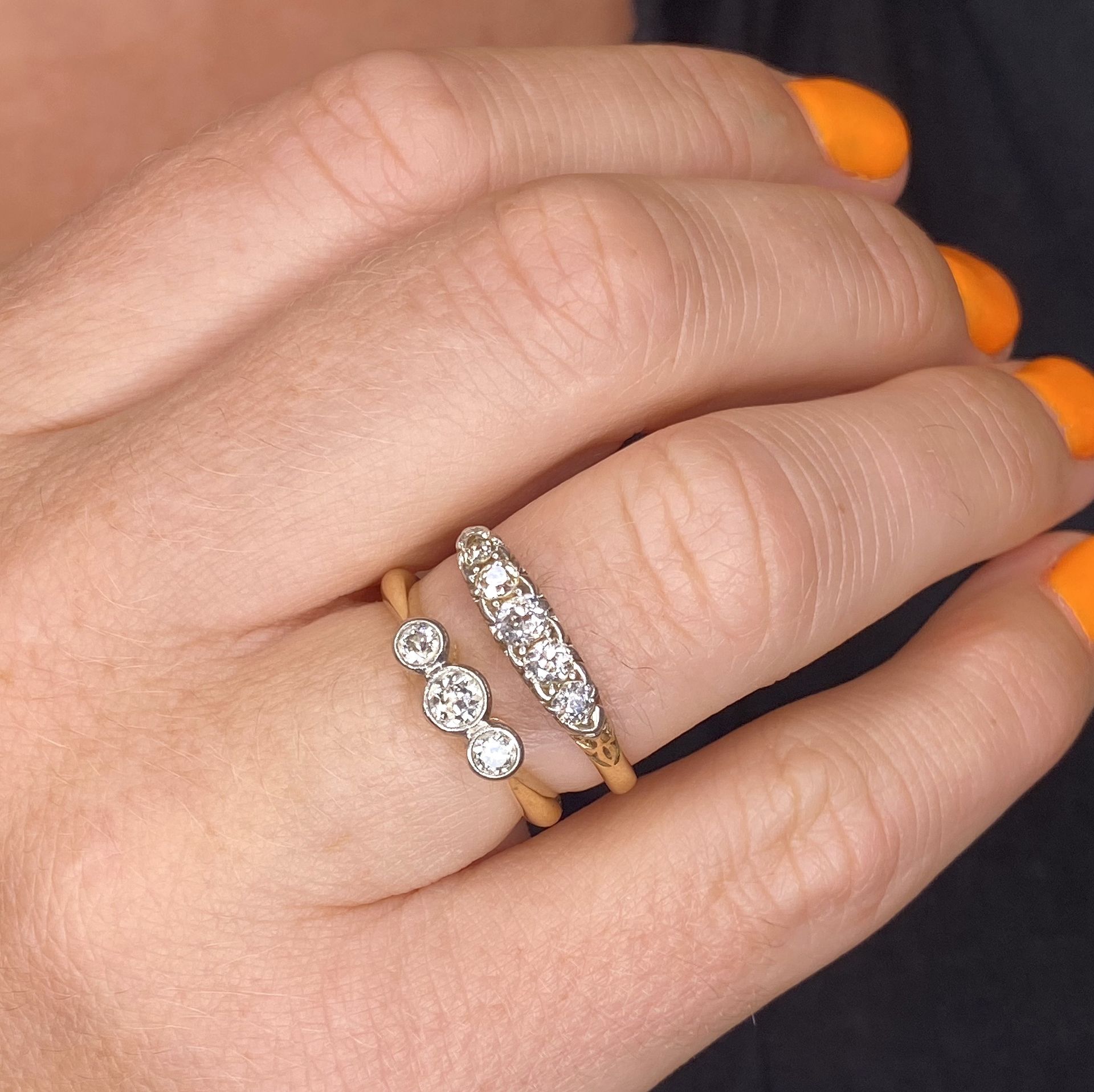 Two diamond rings, comprising a three-stone diamond ring, the transitional-cut diamonds collet-se... - Image 3 of 3