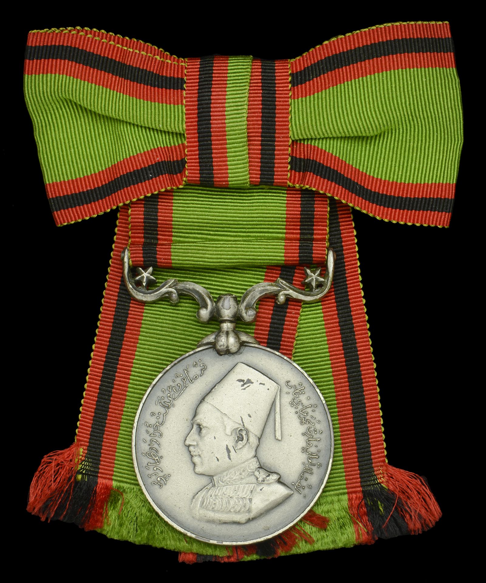 India, Bahawalpur, Tamgha-i-Khidmat Medal, silver, on lady's bow riband, in Spink and Son ca...