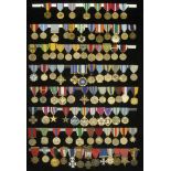 United States of America, A framed display of 92 United States Decorations and Medals coveri...