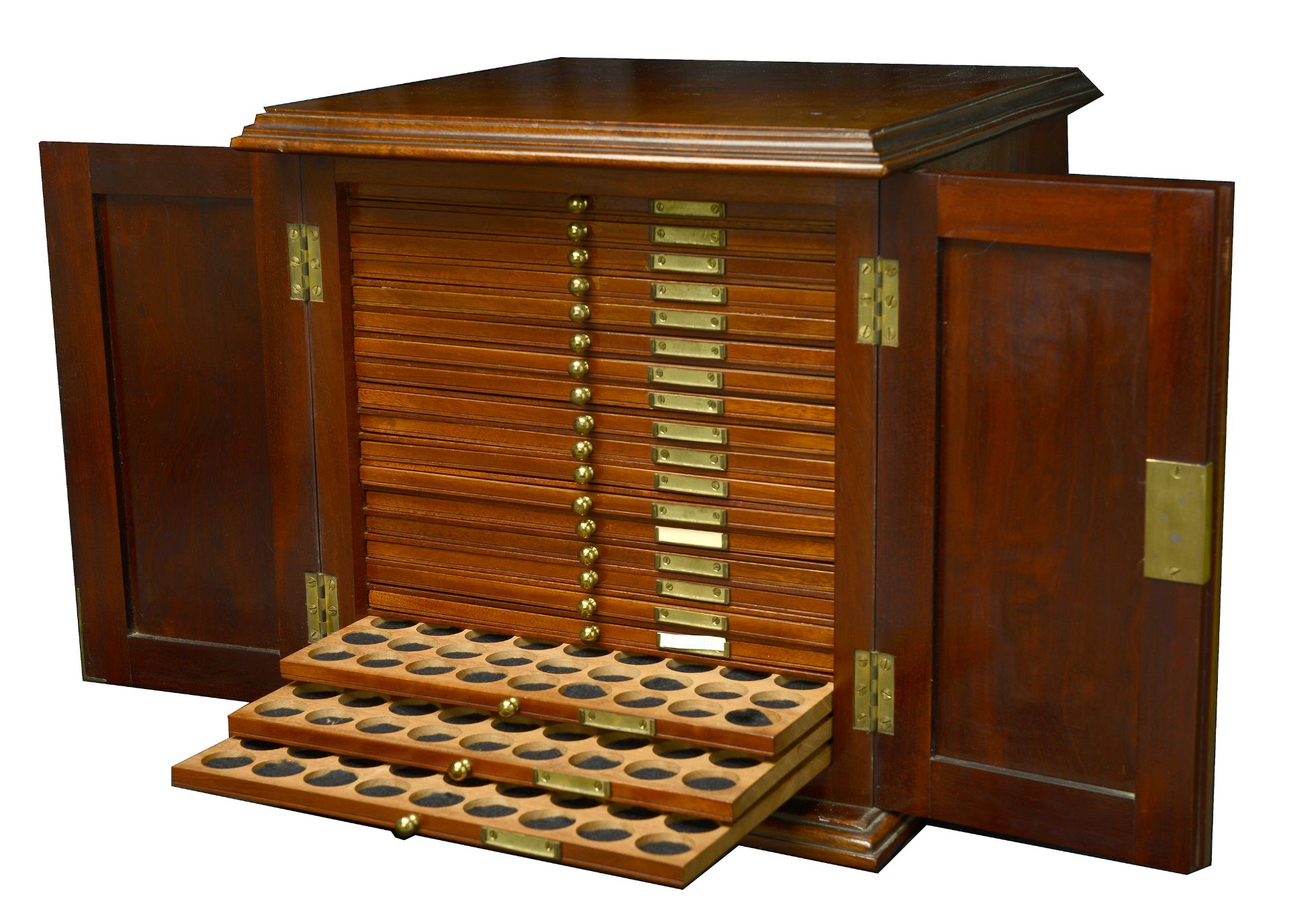 A mahogany coin cabinet, 34 x 34 x 34cm, containing 20 trays double-pierced to house a total...
