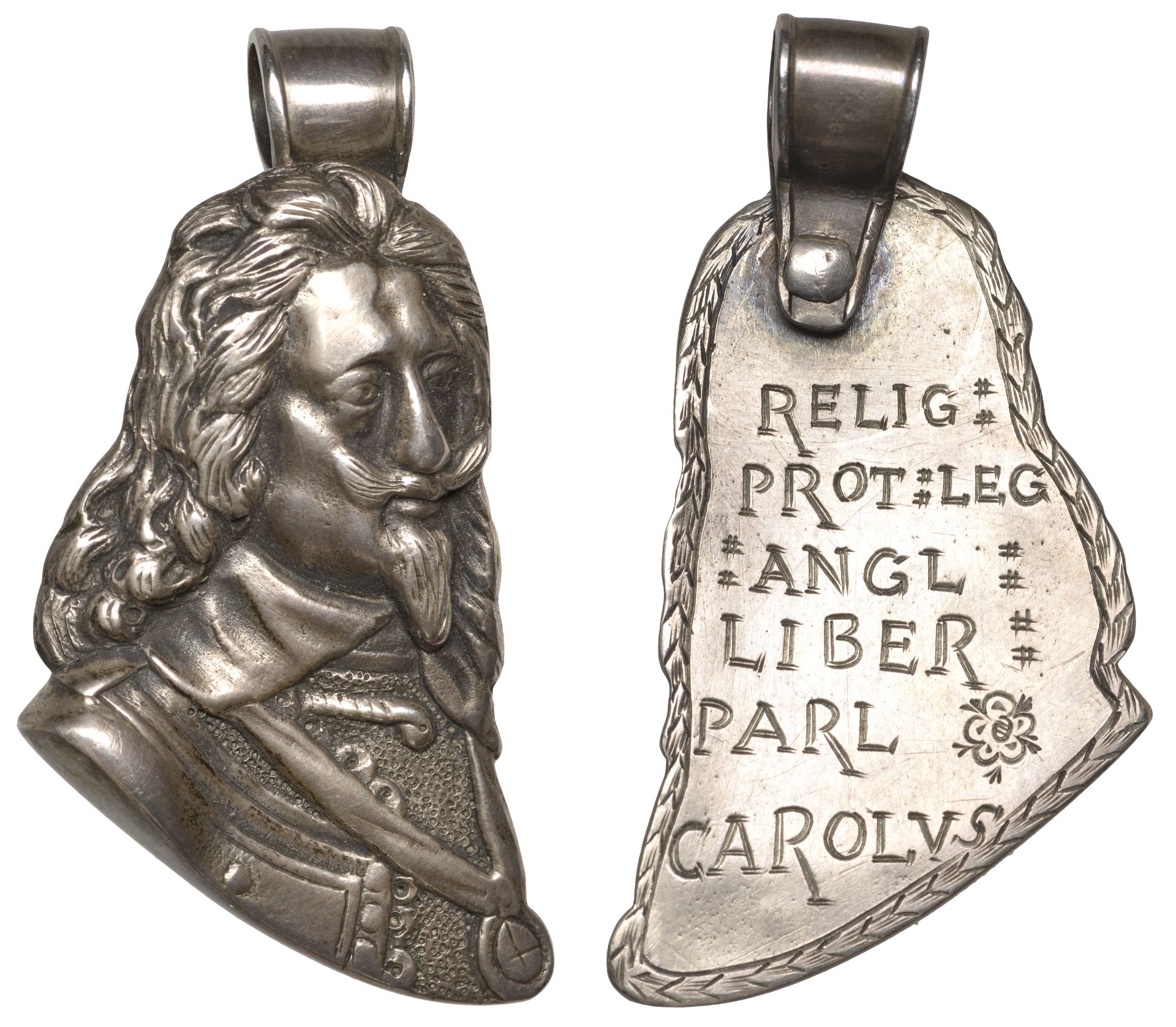 Charles I, a silver badge, unsigned, armoured bust three-quarters right with long hair and m...
