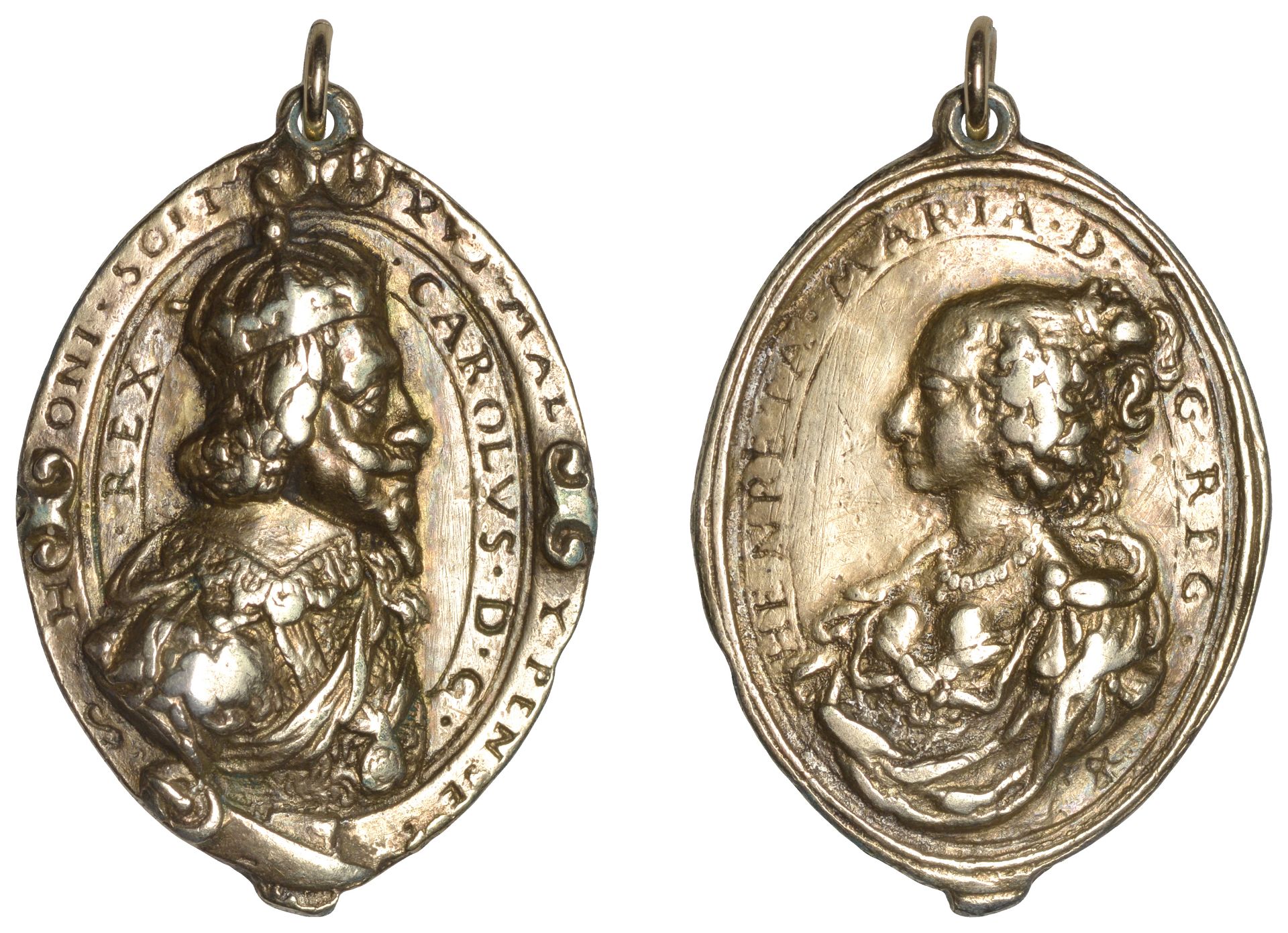 Charles I and Henrietta Maria, a cast and chased silver-gilt Royalist badge, unsigned [by T....