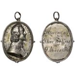 Charles I, a cast and chased silver Royalist badge by T. Rawlins, bare-headed bust right wit...