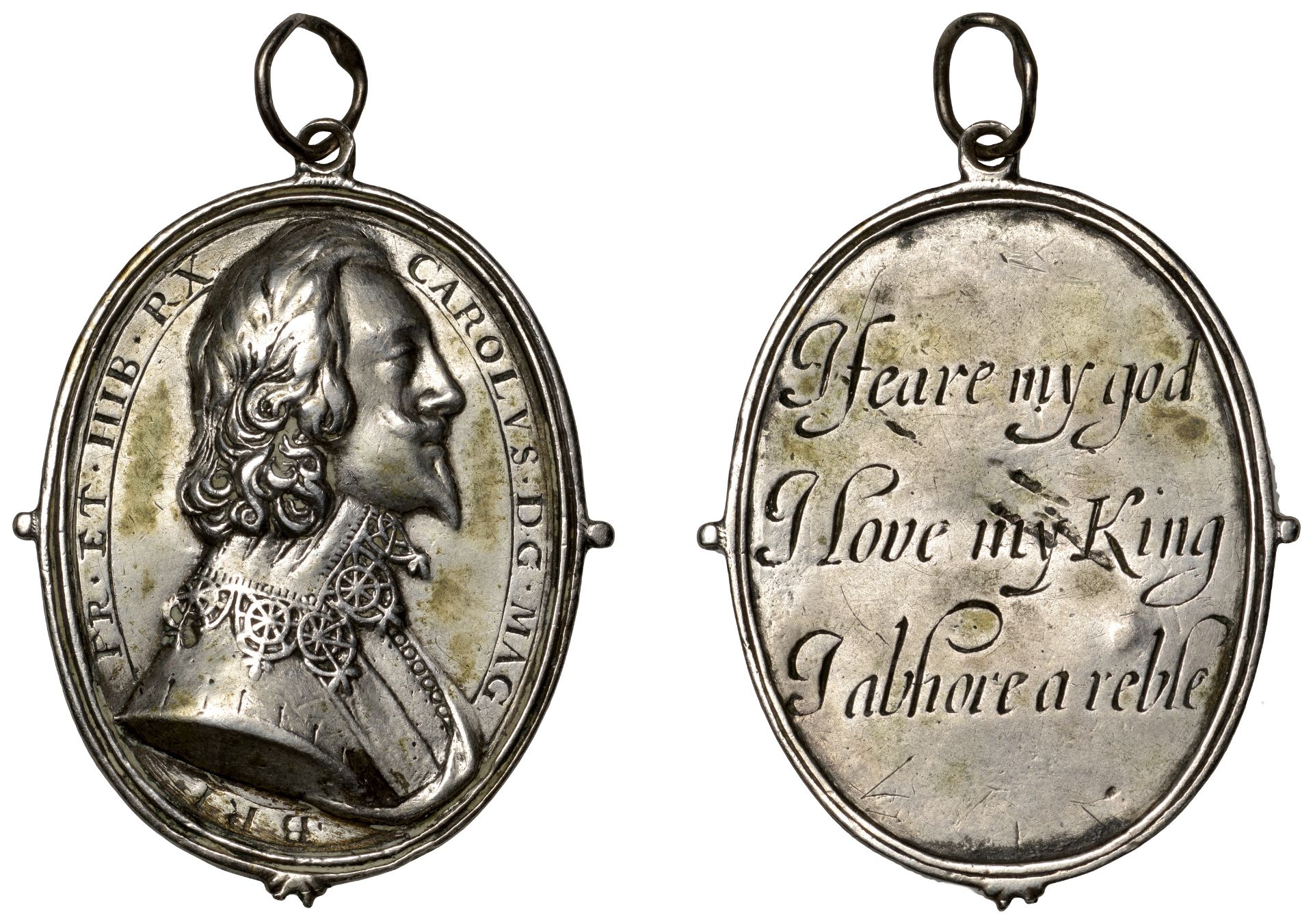 Charles I, a cast and chased silver Royalist badge by T. Rawlins, bare-headed bust right wit...